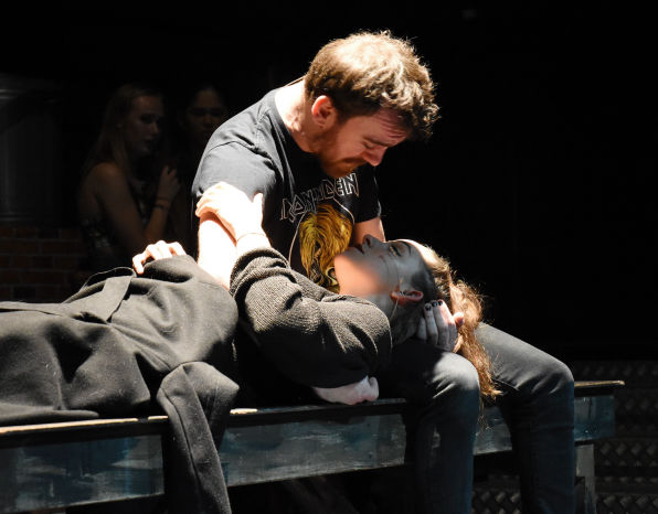 Actor on stage in the musical called RENT